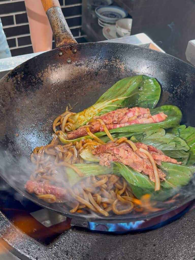 Beef stir fried until just cooked through