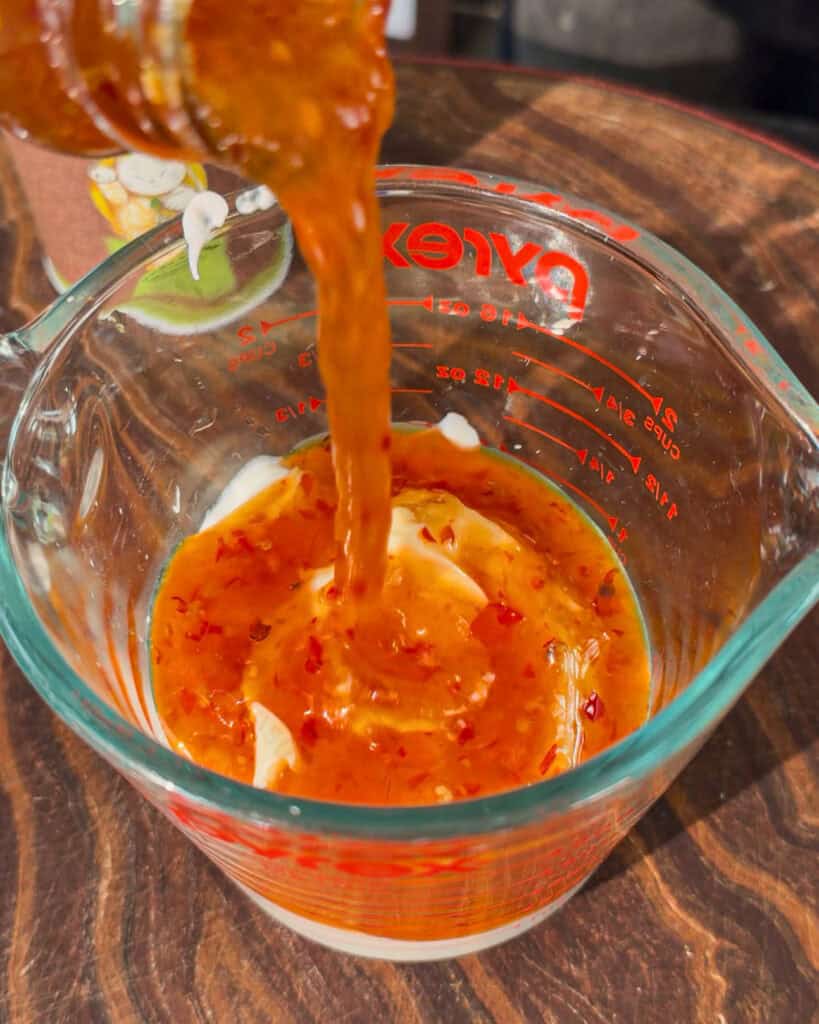 Sweet chilli sauce added to creamy dressing mixture